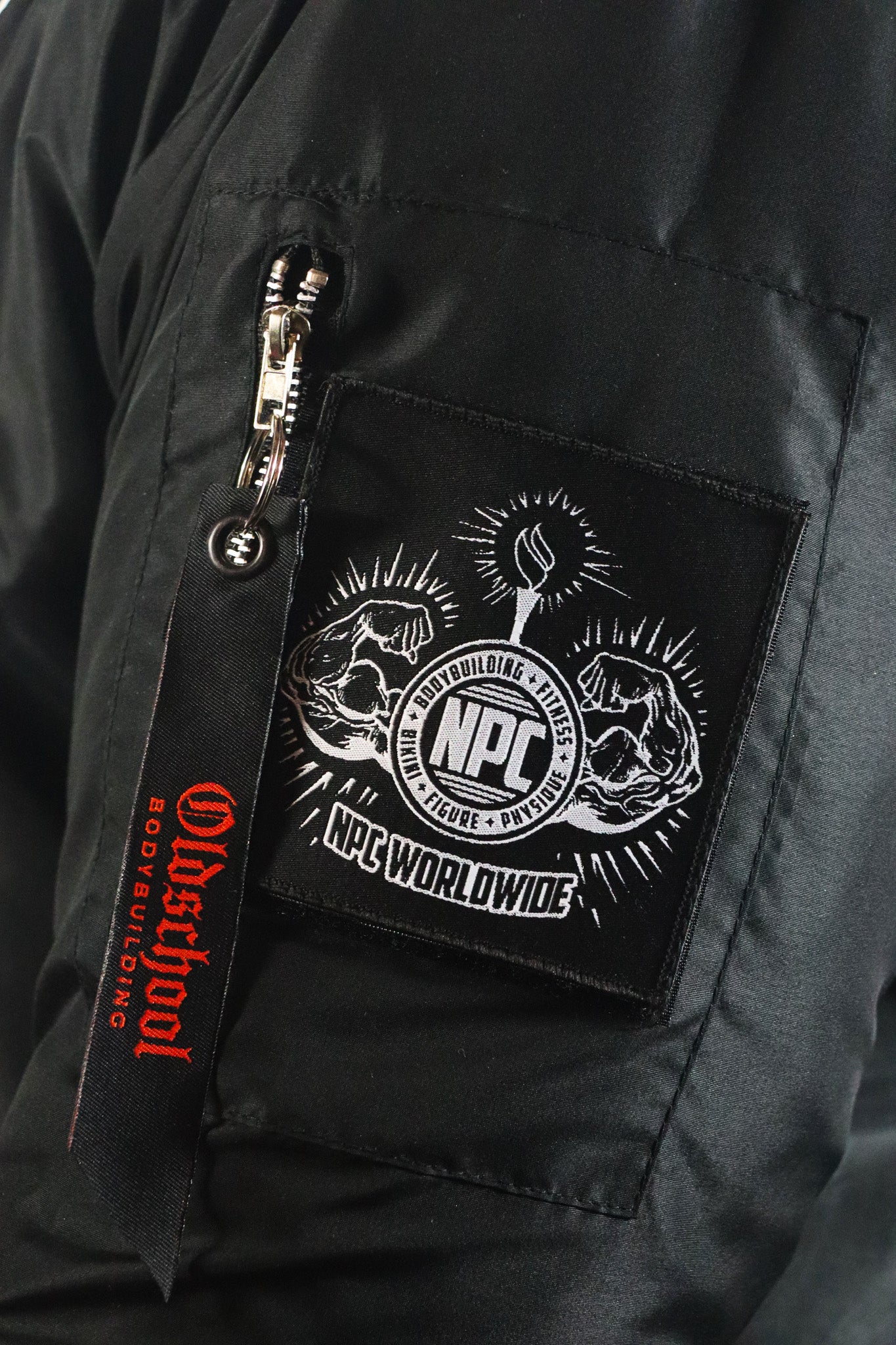 BADGES WINTER JACKET SCHWARZ/ORANGE